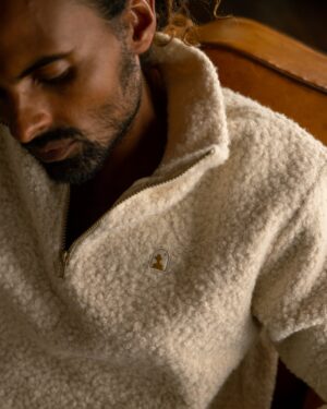 man sitting in Cusco Sherpa Pullover