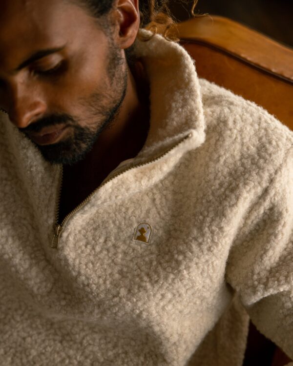 man sitting in Cusco Sherpa Pullover