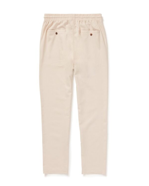 The Dandy Del Mar Brisa Linen Pant - Vintage Ivory in beige.