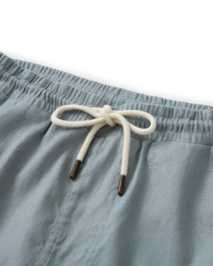 A pair of Dandy Del Mar's Brisa Linen Pant in Abalone, perfect for vacation.