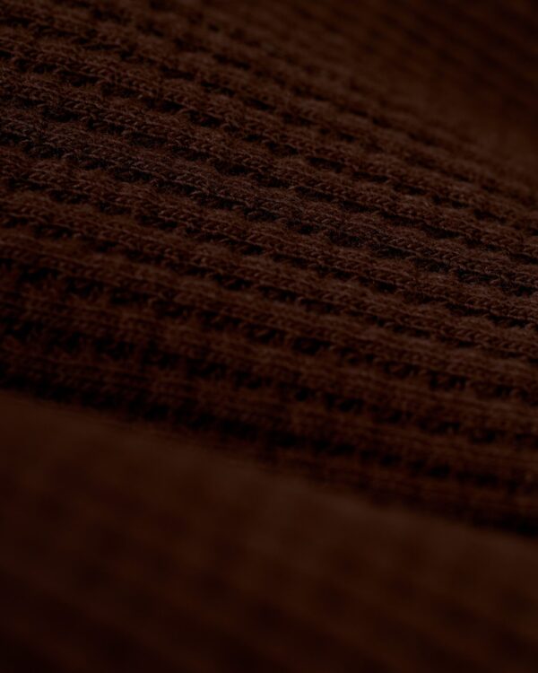 Close-up image of The Cannes Waffle Knit Shirt - Carajillo by Dandy Del Mar, highlighting the intricate details of its 100% cotton waffle knit fabric.