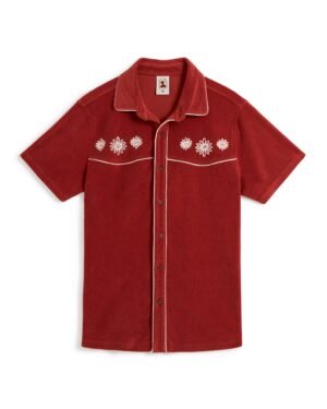 The Gaucho Shirt - Rouge by Dandy Del Mar is a red short-sleeve button-up with white floral embroidery on the chest and elegant piping along the seams, beautifully displayed on a white background.