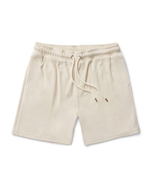 The Gaucho Shorts - Alabaster by Dandy Del Mar feature an elastic waistband, drawstring, side pockets, and a relaxed fit, offering a touch of Equatorial Cowboy style.